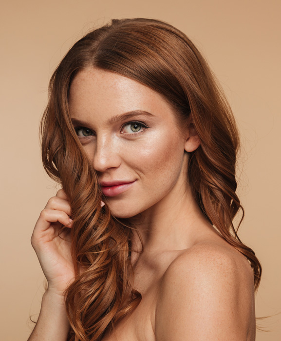 Jak dbać o włosy latem?